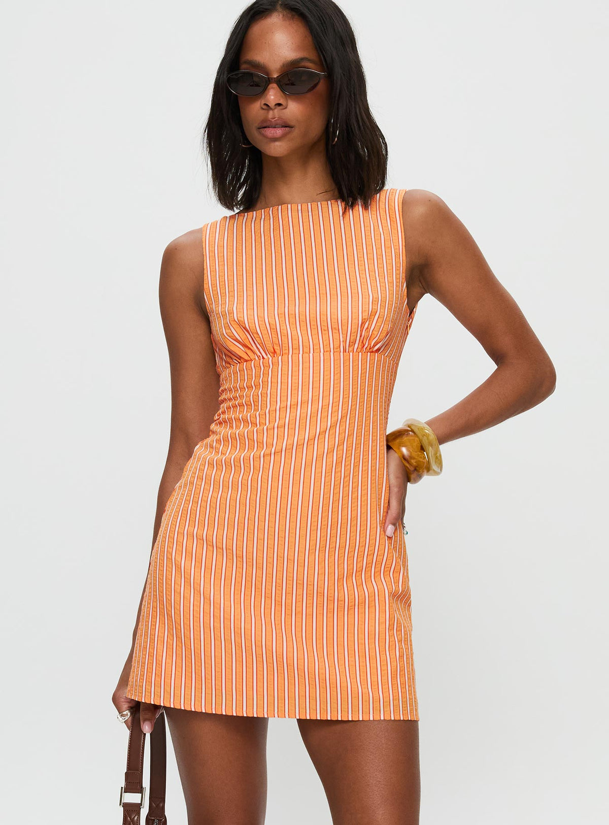 front view of model wearing Princess Polly Ellesandra Boat Neck Mini Dress Orange Stripe Boat Neck 