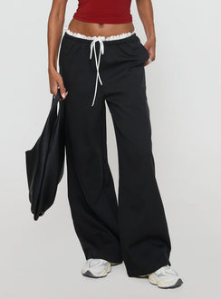 side view of model wearing Princess Polly Pilly Pants Black High Rise Pants Pants 