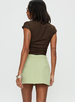 back view of model wearing Princess Polly Hosier Twill Mini Skirt Green Skirts 