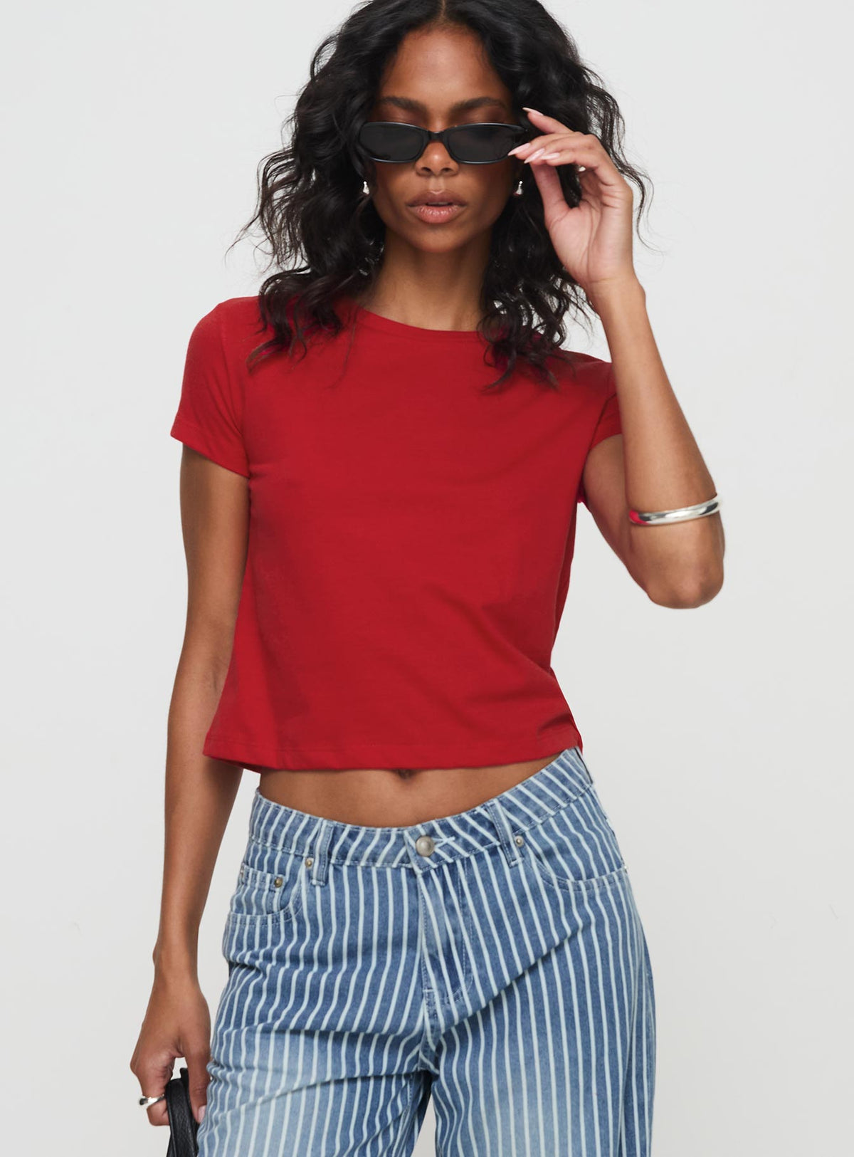 front view of model wearing Princess Polly Micah Tee Red Short Sleeves Crew Neck 