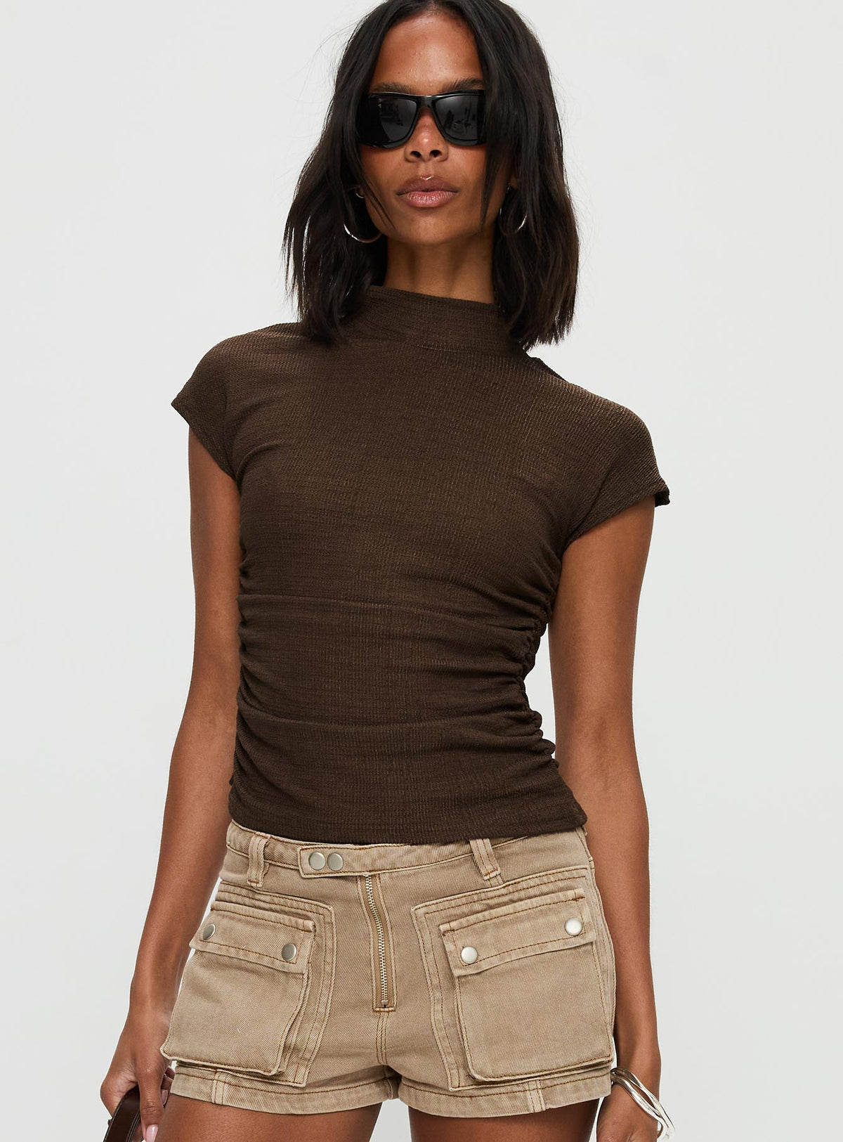 side view of model wearing Princess Polly Make A Plan Top Brown Short Sleeves High Neck 