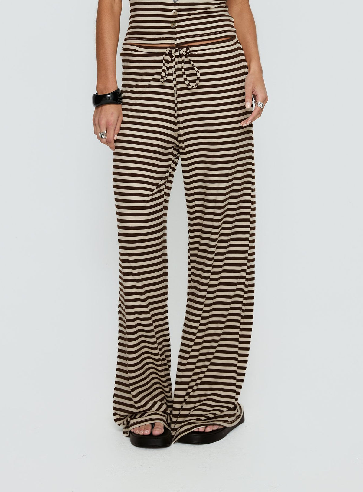 front view of model wearing Princess Polly Gavrielle Jersey Wide Leg Pants Chocolate / Cream Stripe Mid Rise Pants Pants 