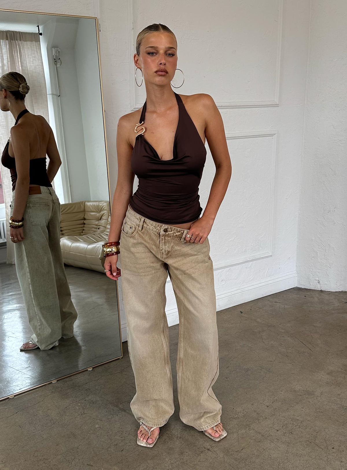 side view of model wearing Princess Polly Ellanor Low Rise Straight Leg Jeans Tan Low Rise Jeans Jeans 