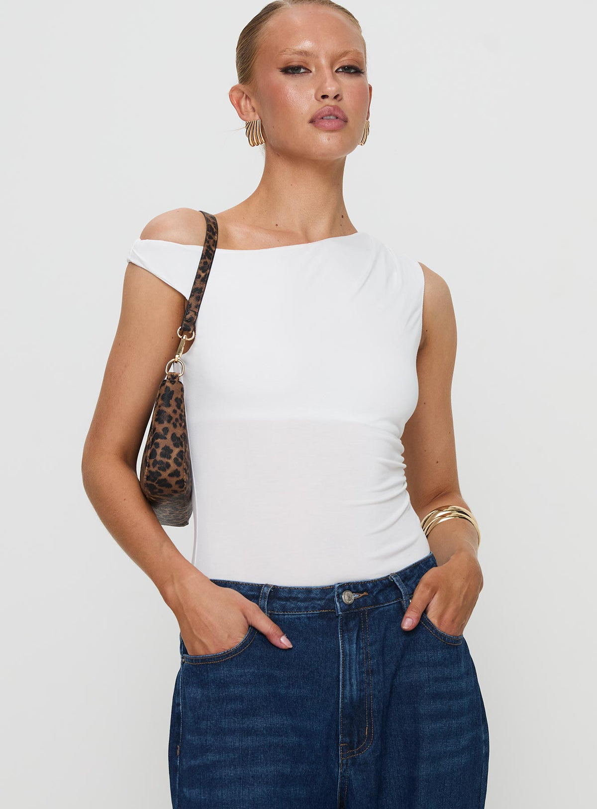 front view of model wearing Princess Polly Miyako Bodysuit White Sleeveless Bodysuit 