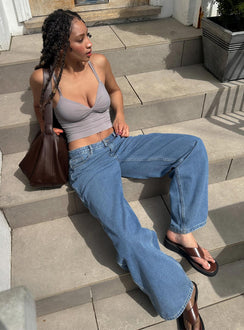 front view of model wearing Princess Polly Maryanne Mid Rise Relaxed Jeans Mid Wash Denim Tall Mid Rise Jeans Jeans 