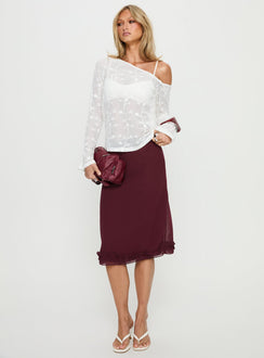   side view of model wearing Princess Polly Rosette Frill Midi Skirt Currant Skirts 