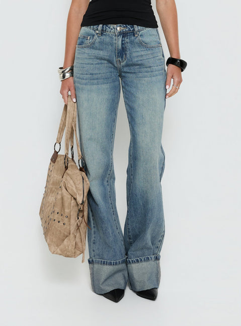 back view of model wearing Princess Polly Ezia Wide Cuff Baggy Jeans Raw Denim Mid Rise Jeans Jeans 