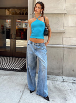 Showcasing the Naylor Mid Rise Wide Leg Jeans Light Wash Denim Tall in womens-jeans with mid-rise front view of model wearing Princess Polly