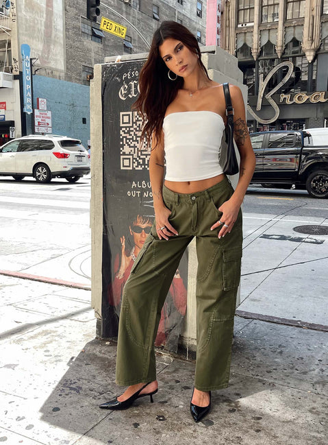 front view of model wearing Princess Polly Ahstin Mid Rise Straight Leg Cargo Jeans Green Petite Mid Rise Jeans Jeans 