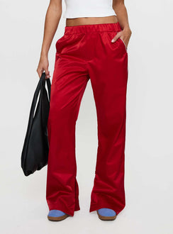 back view of model wearing Princess Polly Travalta Satin Track Pant Red Low Rise Pants Pants 