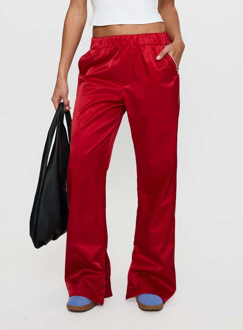 back view of model wearing Princess Polly Travalta Satin Track Pant Red Low Rise Pants Pants 