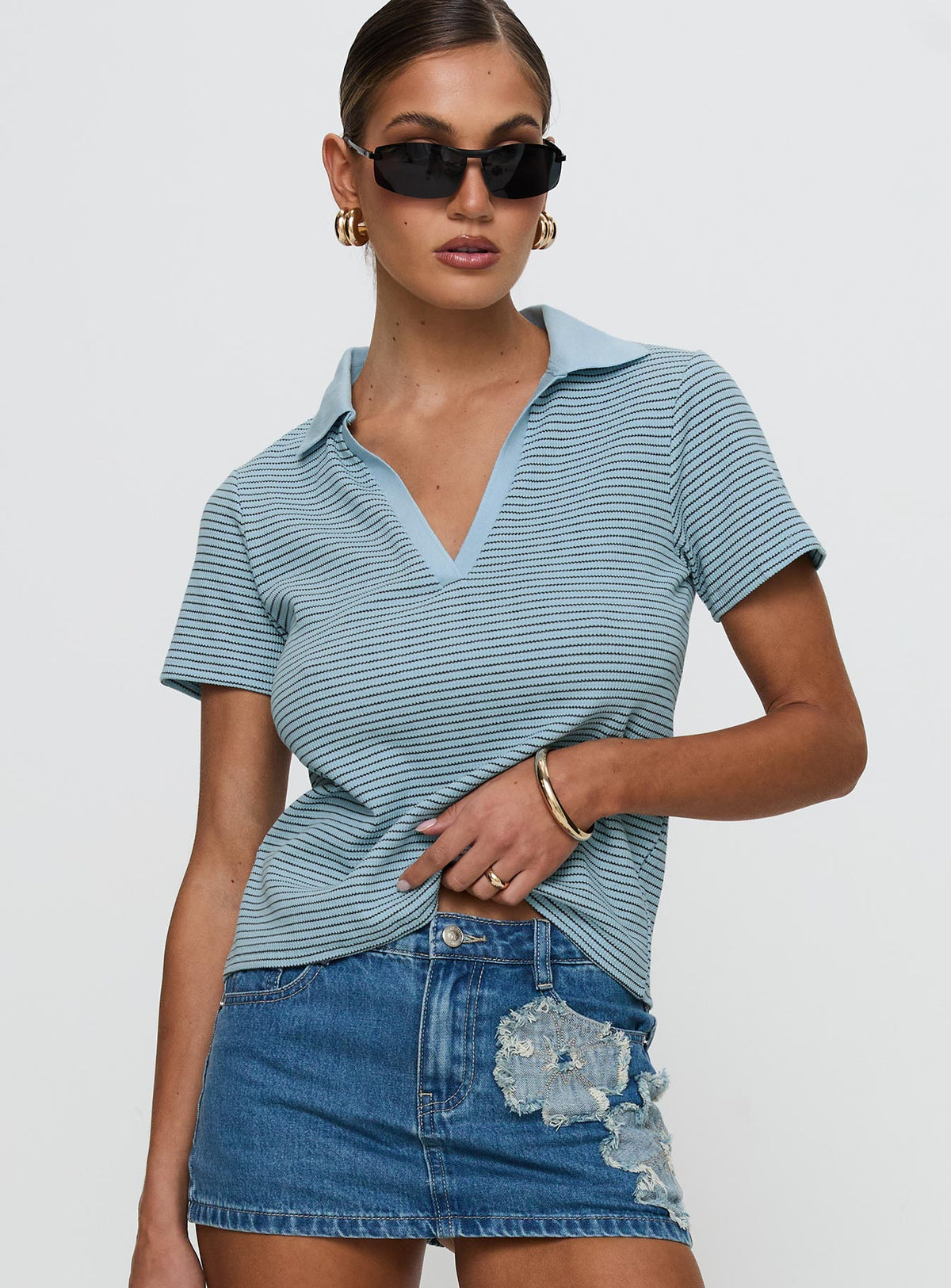front view of model wearing Princess Polly Ralphy Collared Top Blue Stripe Short Sleeves V-Neck 