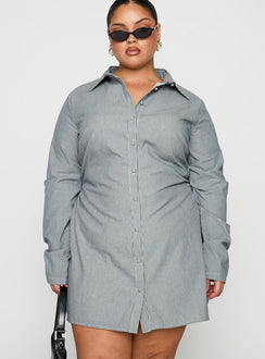 side view of model wearing Princess Polly Publicity Long Sleeve Mini Dress Blue Pinstripe Curve V-Neck 