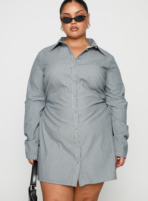 side view of model wearing Princess Polly Publicity Long Sleeve Mini Dress Blue Pinstripe Curve V-Neck 