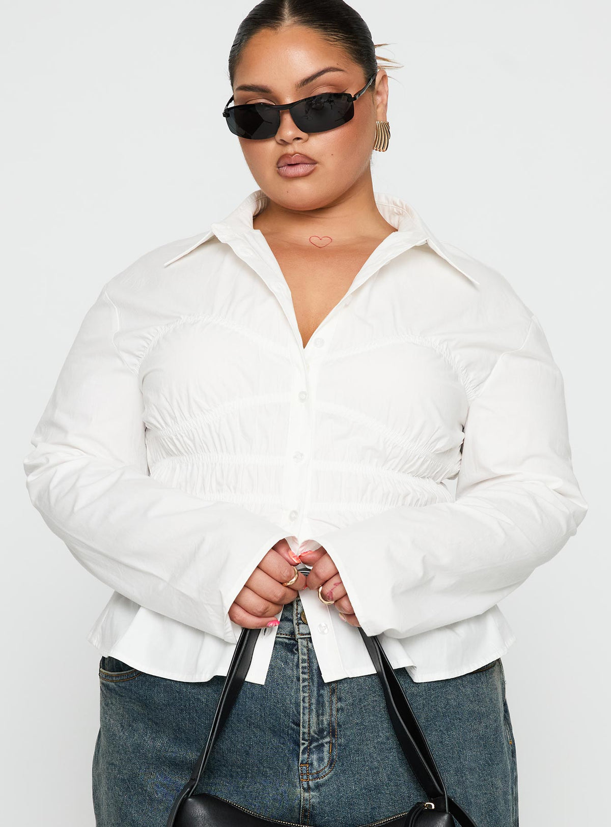 front view of model wearing Princess Polly Liesel Shirred Long Sleeve Top White Curve Full Sleeves V-Neck 