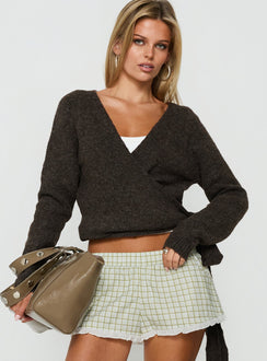 Featuring the Tonee Wrap Knit Cardigan in Chocolate womens jumpers with short length front view of model wearing Princess Polly
