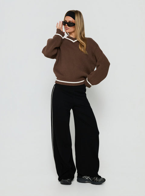Crafted with the Myrandah V Neck Long Sleeve Knit Jumper Chocolate Stripe in womens-jumpers with short length and oversized fit side view of model wearing Princess Polly