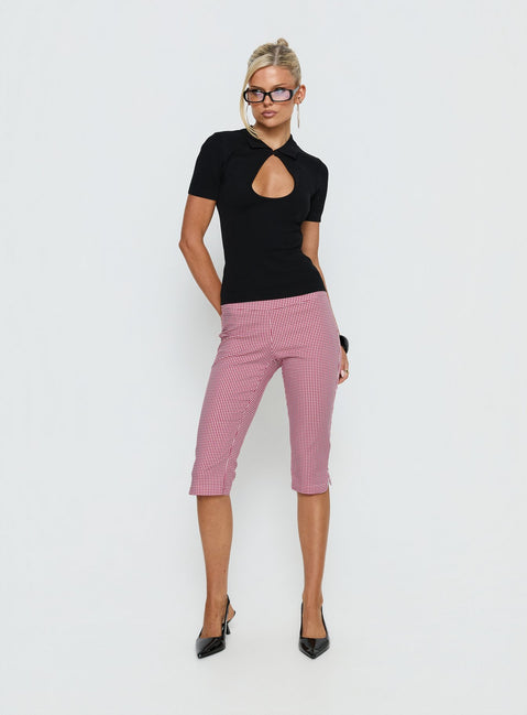 Showcasing Rossie Capri Pants Red Gingham womens-regular-pants with high-rise front view of model wearing