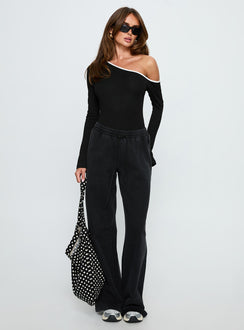 side view of model wearing Princess Polly Andrielle One Shoulder Long Sleeve Bodysuit Black / White Long Sleeve Tops Bodysuit 