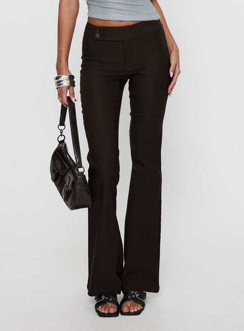 front view of model wearing Princess Polly Kinkirk Flared Pants Chocolate Tall Low Rise Pants Pants 