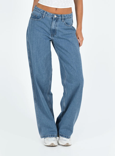 side view of model wearing Princess Polly Maryanne Mid Rise Relaxed Jeans Mid Wash Denim Tall Mid Rise Jeans Jeans 