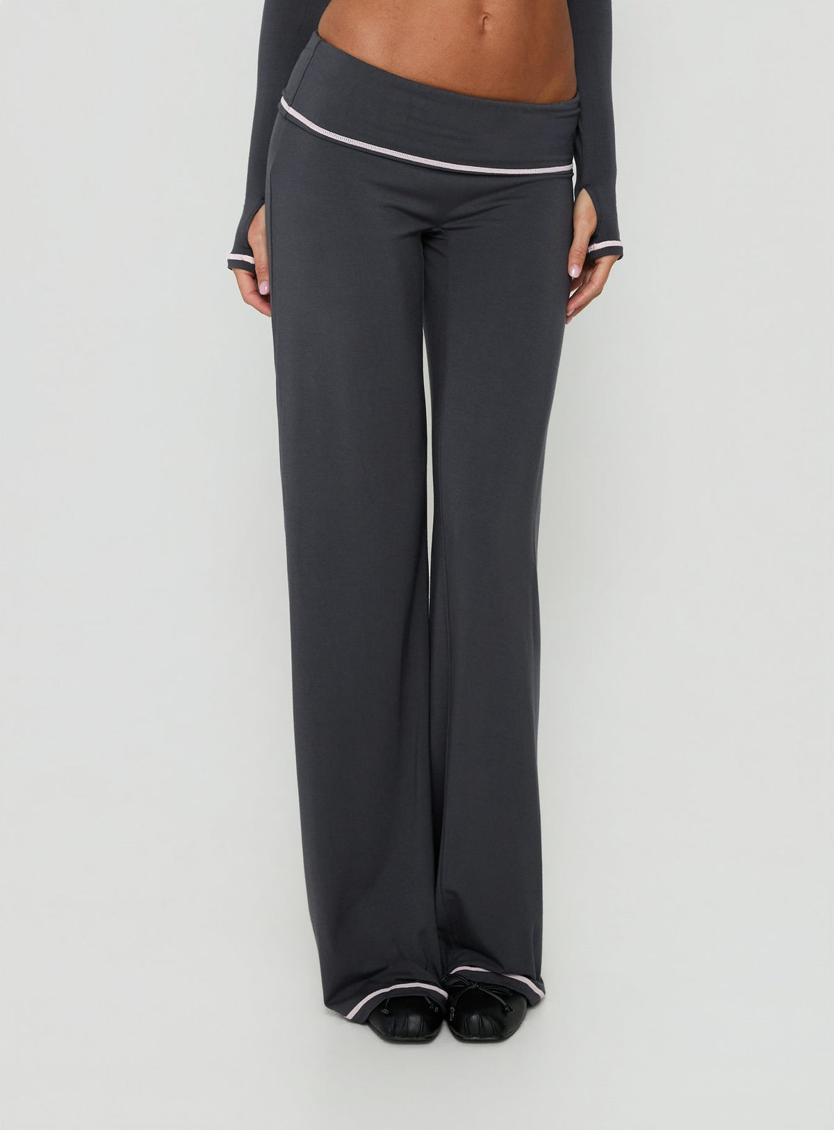 Showcasing the Kimberlyn Jersey Straight Leg Pants Grey in womens-regular-pants with low-rise front view of model wearing Princess Polly