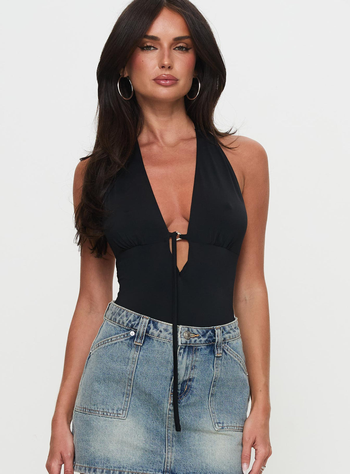 front view of model wearing Princess Polly Two Summers Plunge Neck Bodysuit Black Sleeveless Bodysuit 