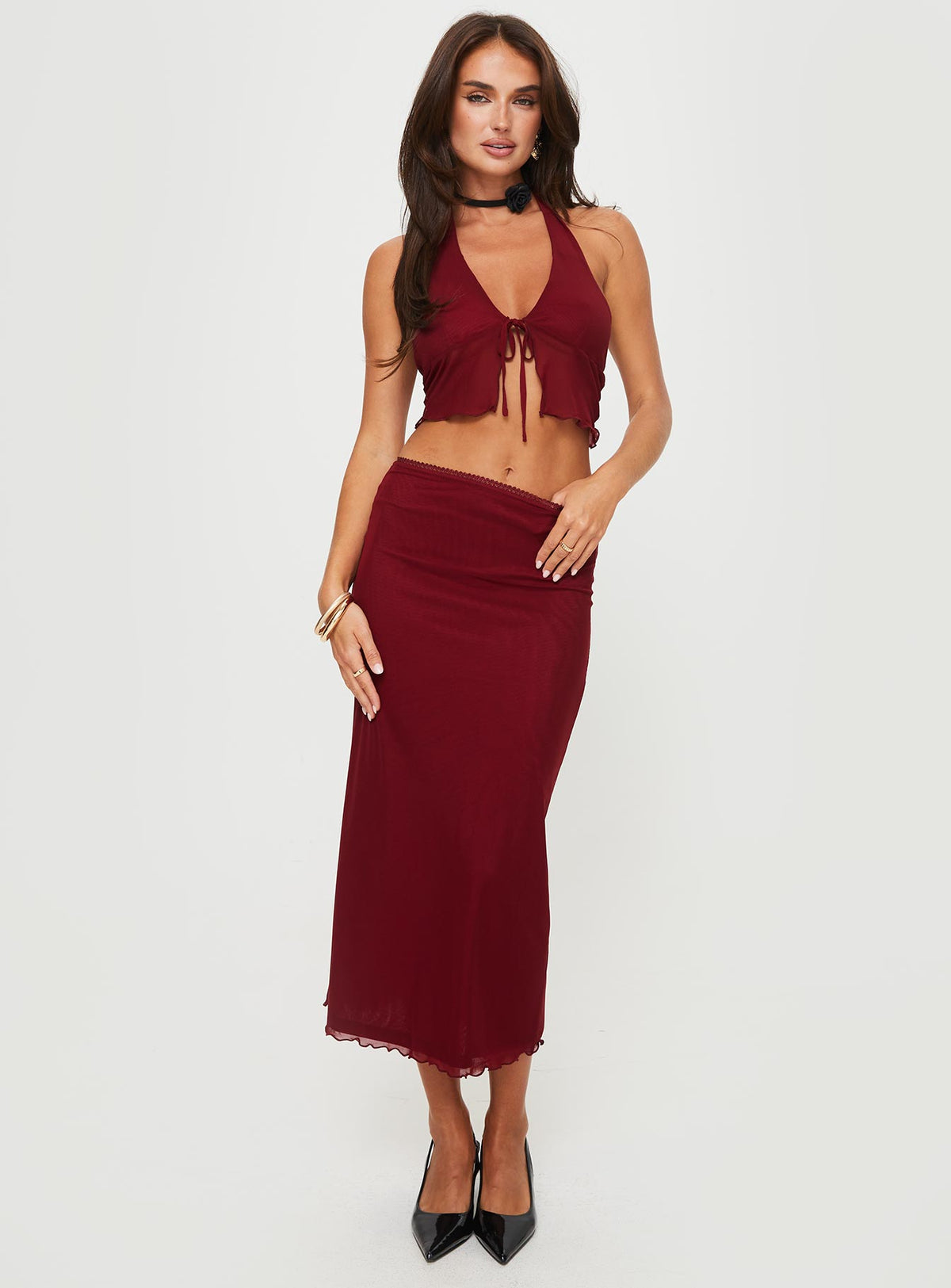 Matching set, mesh material Crop top, halter neck tie, tie fastening at bust Low rise maxi skirt, split hem, lettuce edge hem Good stretch, partially lined