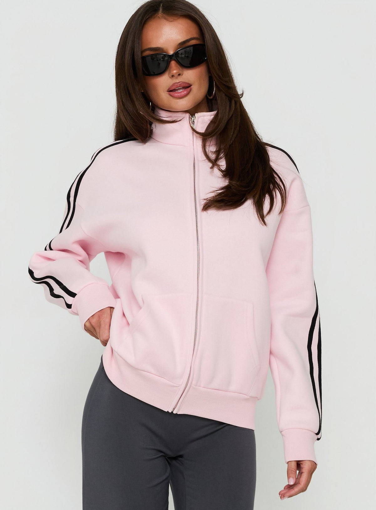 Featuring the Keeran Funnel Neck Fleece Jumper Pink / Black womens jumpers with long length and oversized high-neck design Princess Polly