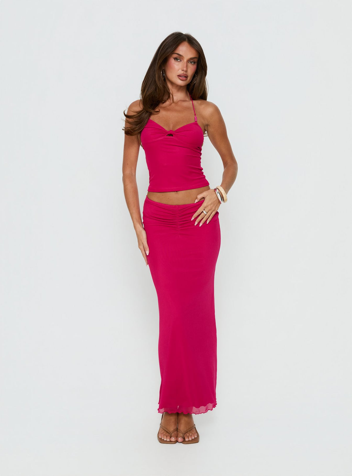   front view of model wearing Princess Polly Jailon Ruched Maxi Skirt Guava Maxi Skirts Skirts 
