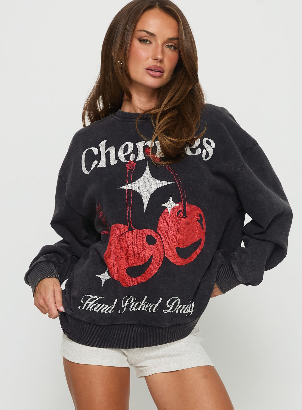 front view of model wearing Princess Polly Hand Picked Graphic Jumper Black Jumpers 