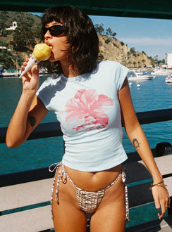 back view of model wearing Princess Polly Owenz Hibiscus Baby Tee Blue Short Sleeves 