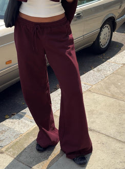 side view of model wearing Princess Polly All Day Straight Leg Sweatpants Wine Pants 
