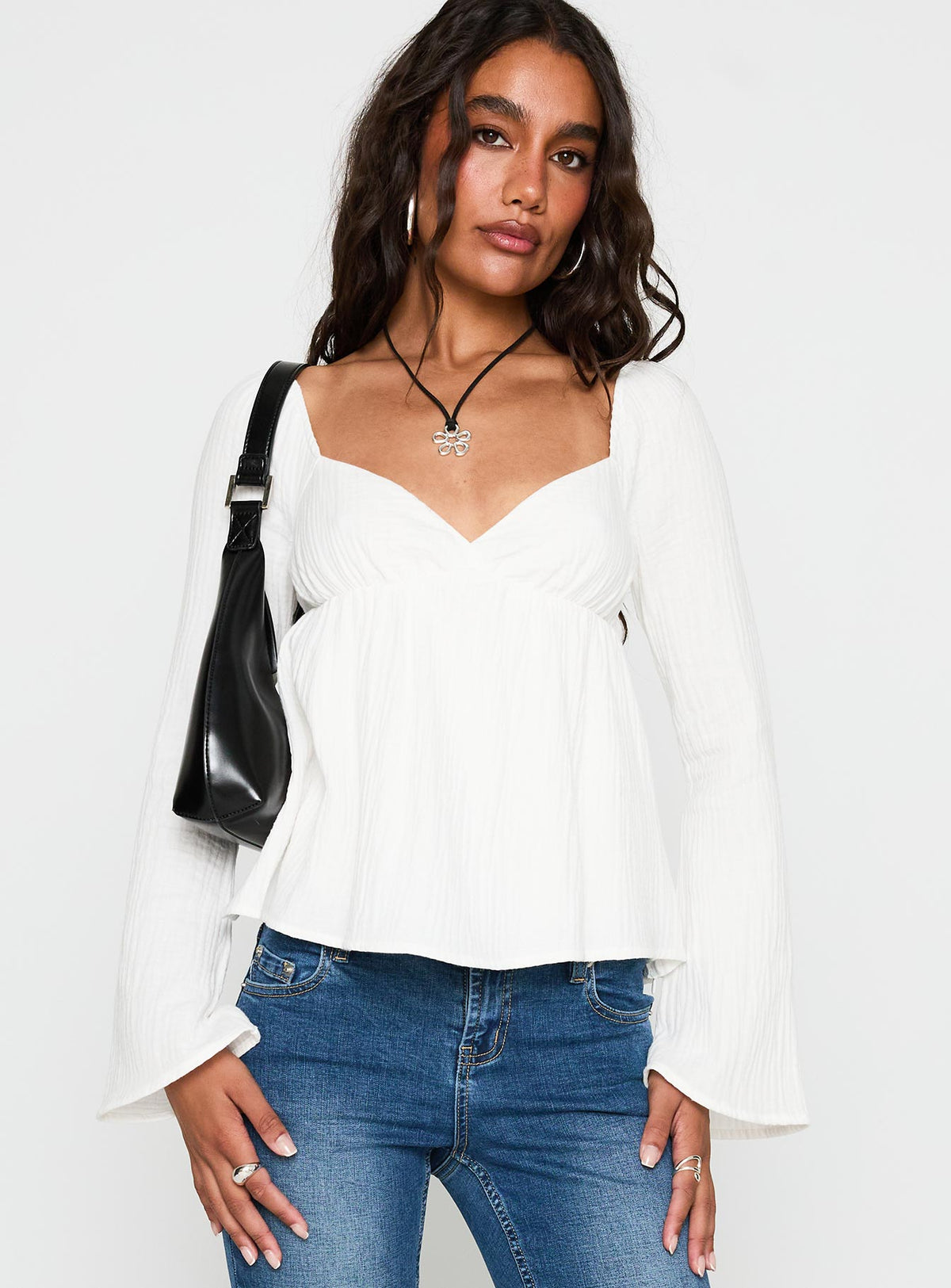front view of model wearing Princess Polly Khalea Long Sleeve Top White Full Sleeves Sweetheart 