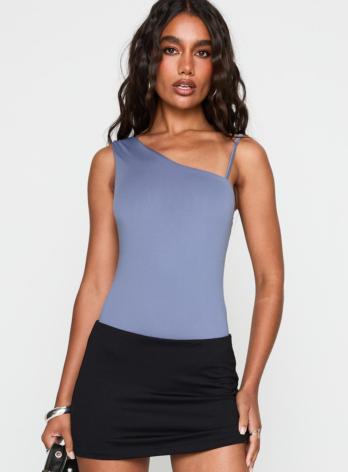 side view of model wearing Princess Polly Catch Up Bodysuit Blue Sleeveless Bodysuit 