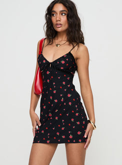 side view of model wearing Princess Polly Emilee Mini Dress Black / Floral Plunger 