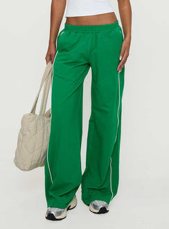 back view of model wearing Princess Polly Field Day Track Pants Green High Rise Pants Pants 