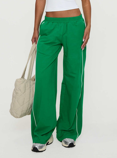 back view of model wearing Princess Polly Field Day Track Pants Green High Rise Pants Pants 