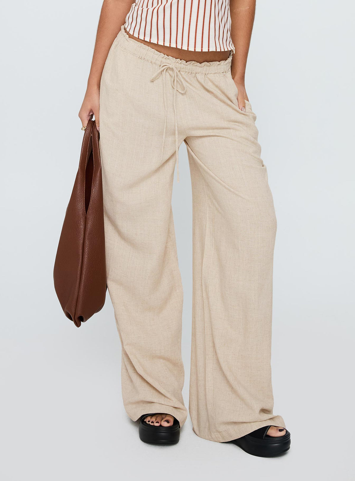 side view of model wearing Princess Polly Seascape Oversize Tie Pants Natural High Rise Pants Pants 