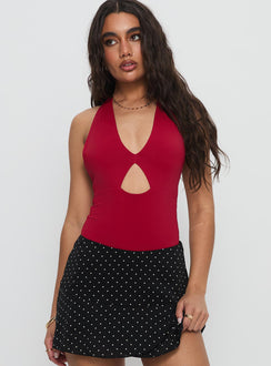 front view of model wearing Princess Polly Sugarberry Cut Out Bodysuit Red Sleeveless Bodysuit 