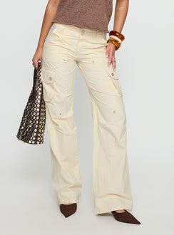 back view of model wearing Princess Polly Remmi Cargo Pants Cream Mid Rise Pants Pants 