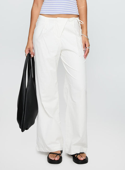 front view of model wearing Princess Polly Leyah Tie Side Pants White Low Rise Pants Pants 
