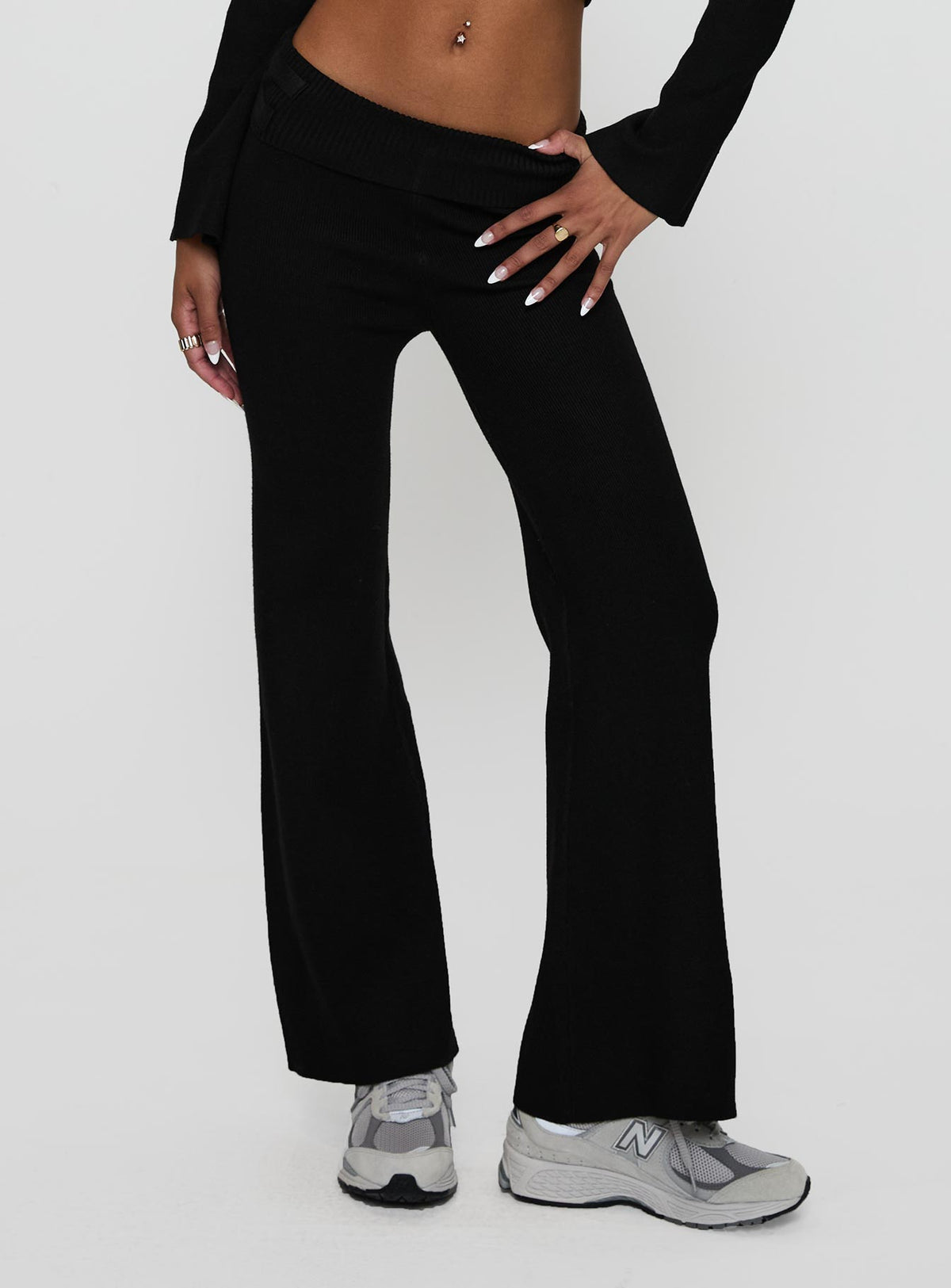 side view of model wearing Princess Polly Try Me Knit Pants Black Low Rise Pants Pants 