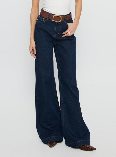 side view of model wearing Princess Polly Goldie High Rise Wide Leg Jeans Indigo High Rise Jeans Jeans 