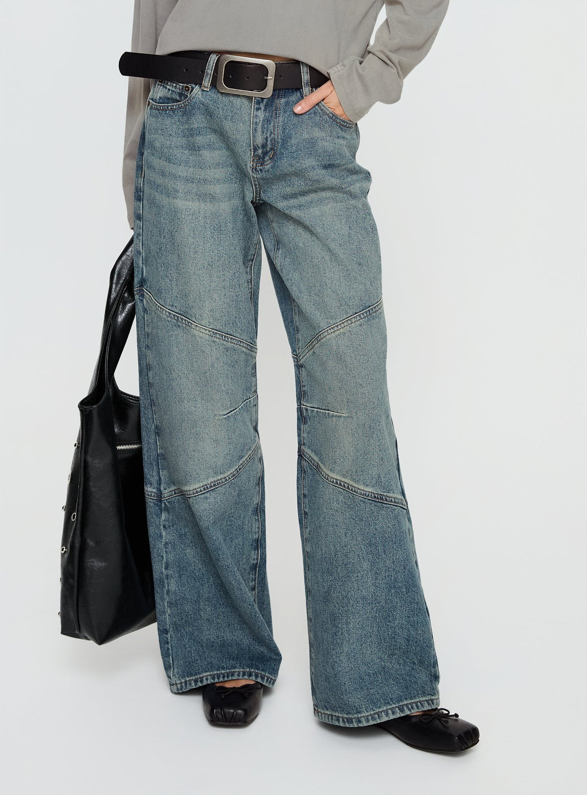 side view of model wearing Princess Polly Atmosphere Mid Rise Straight Leg Jeans Antique Wash Low Rise Jeans Jeans 