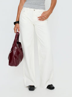 Featuring the Darla Low Rise Straight Leg Jean White womens-jeans side view of model wearing Princess Polly