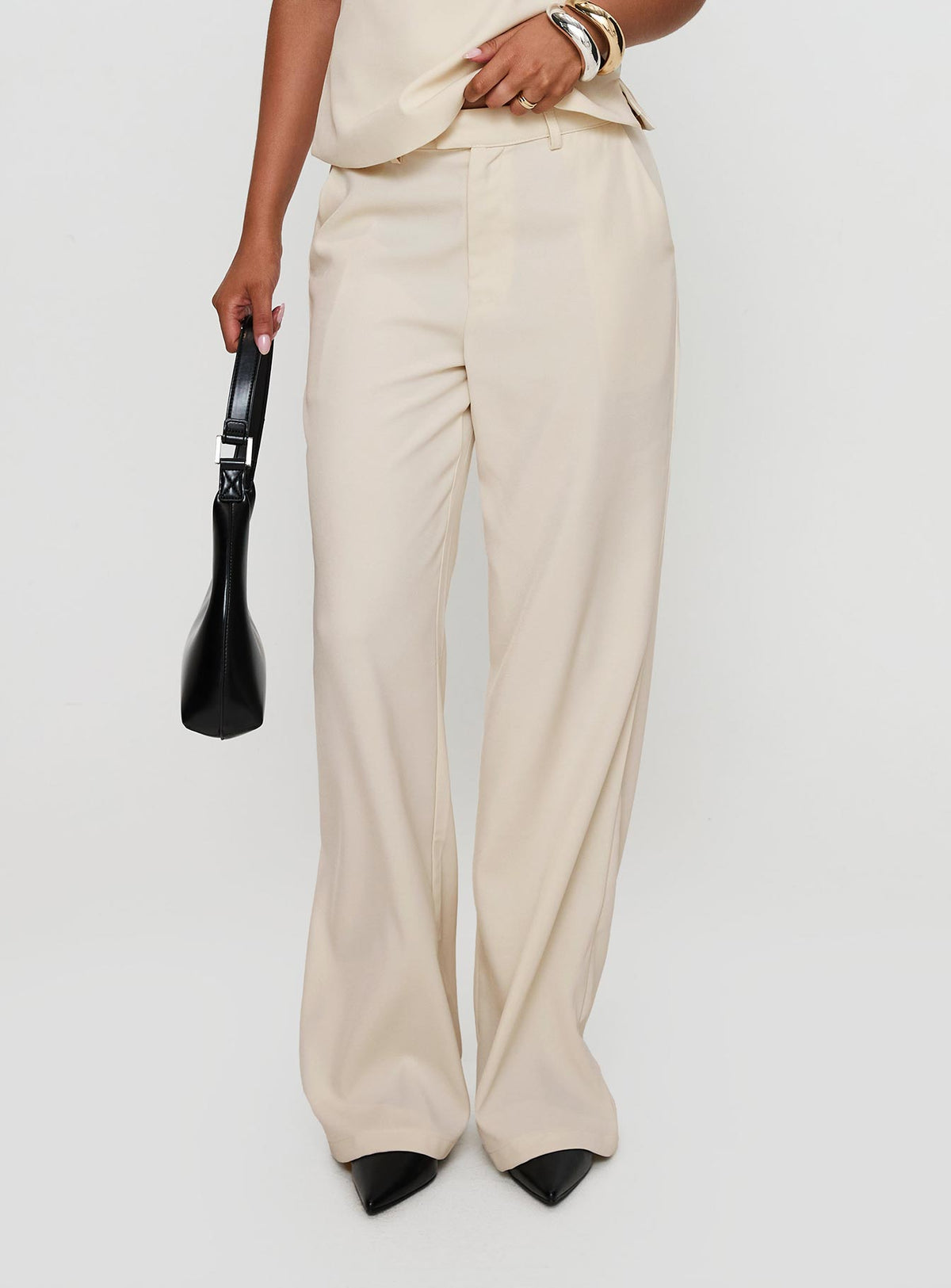 side view of model wearing Princess Polly Irresistible Wide Leg Pant Cream High Rise Pants Pants 