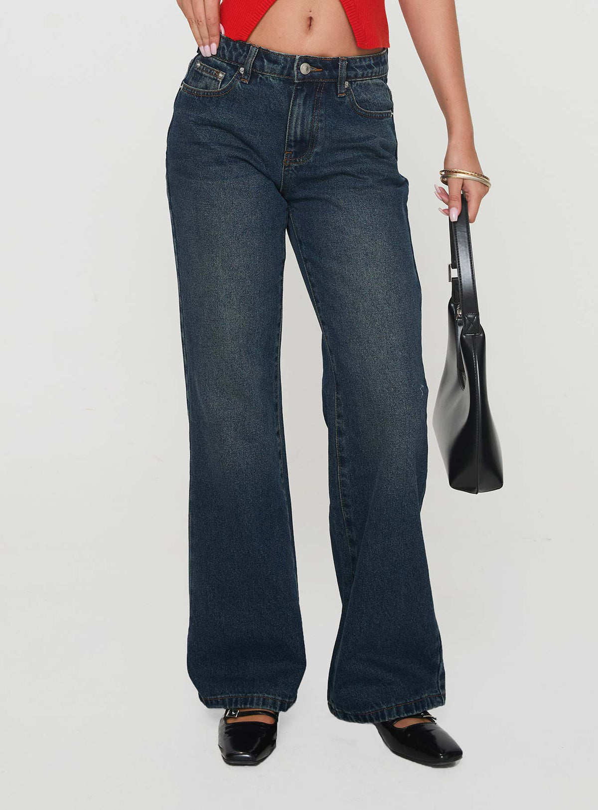 side view of model wearing Princess Polly Cybele Mid Rise Straight Leg Jeans Dark Denim Mid Rise Jeans Jeans 