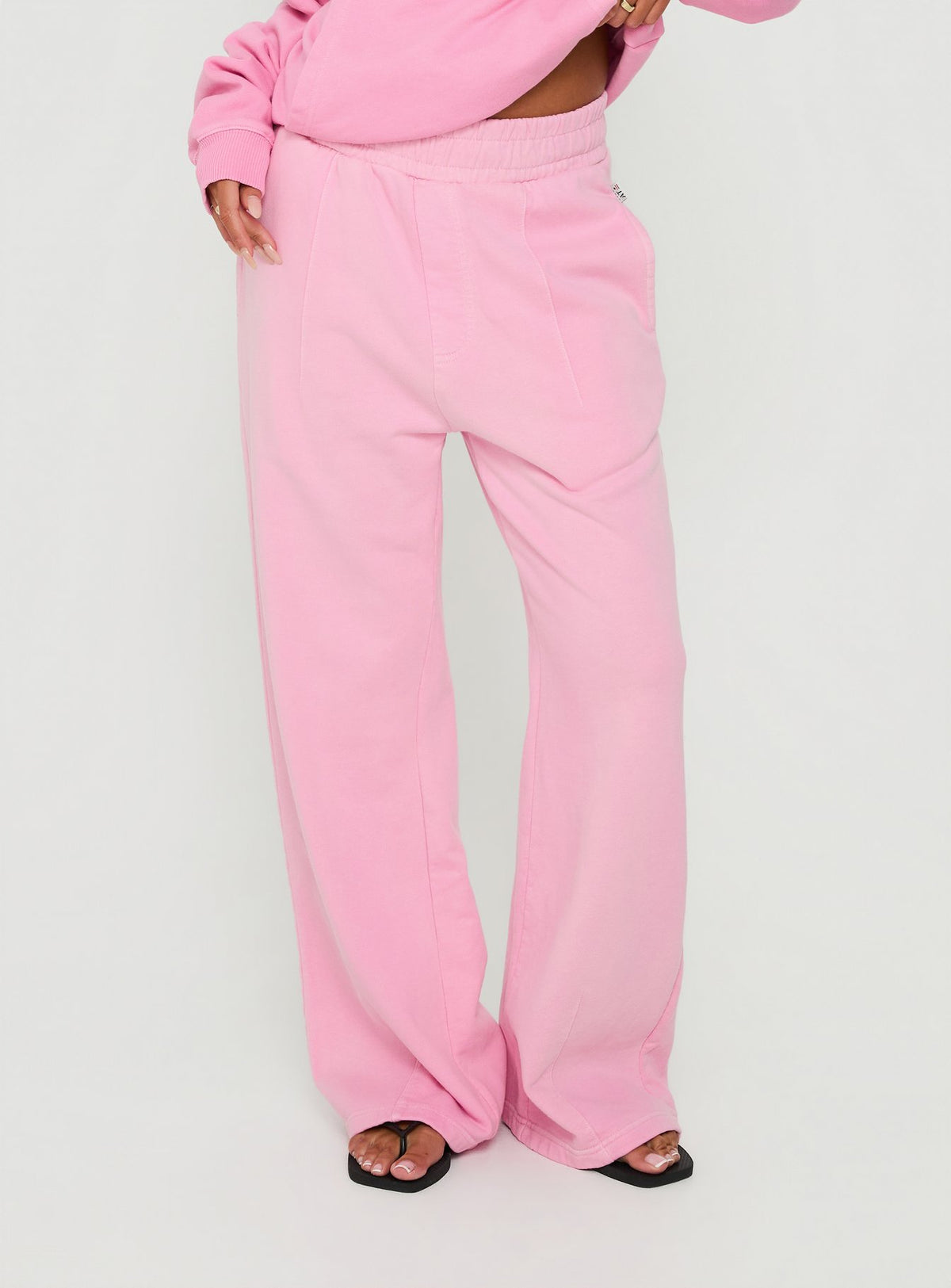 Featuring the AT Fleece Baggy Sweatpant Washed Pink womens-regular-pants with mid-rise waist product Princess Polly