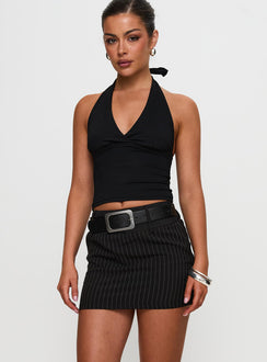 back view of model wearing Princess Polly Christel Pinstripe Skort Black Mini Skirts Skirts 